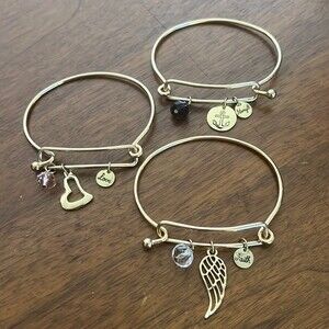 Set of 3 Goldtone bangle bracelets Faith,Strength,Love